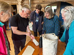 Craft group ‘Branching Out’ viewing the Grace sail-build to pick up some sailmakers' hand-work techniques. Photo credit: Mark Shiner.